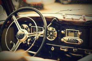 A picture from the inside of an oldtimer with a vignette. It creates an vintage effect to the photo
